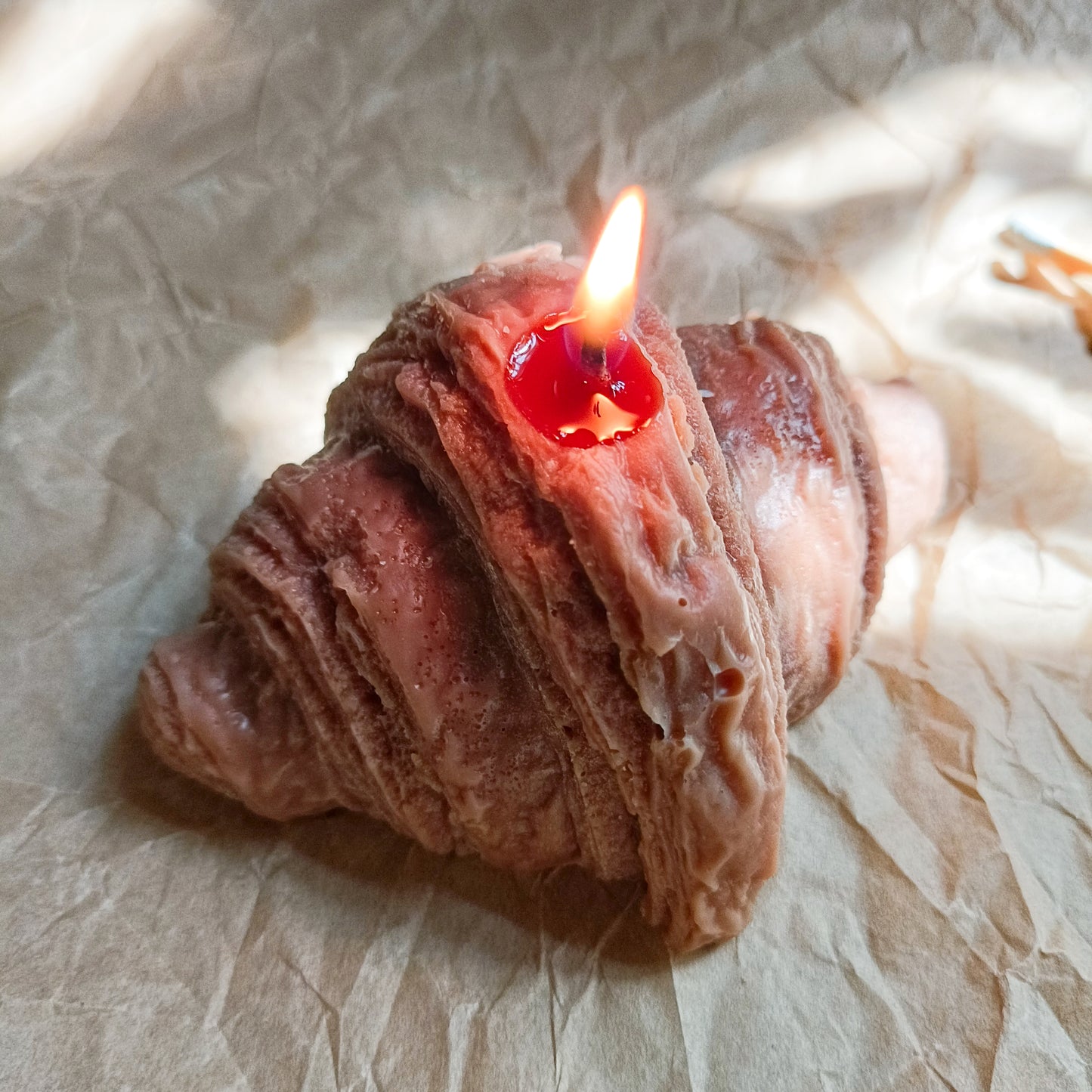 Croissant shaped candle