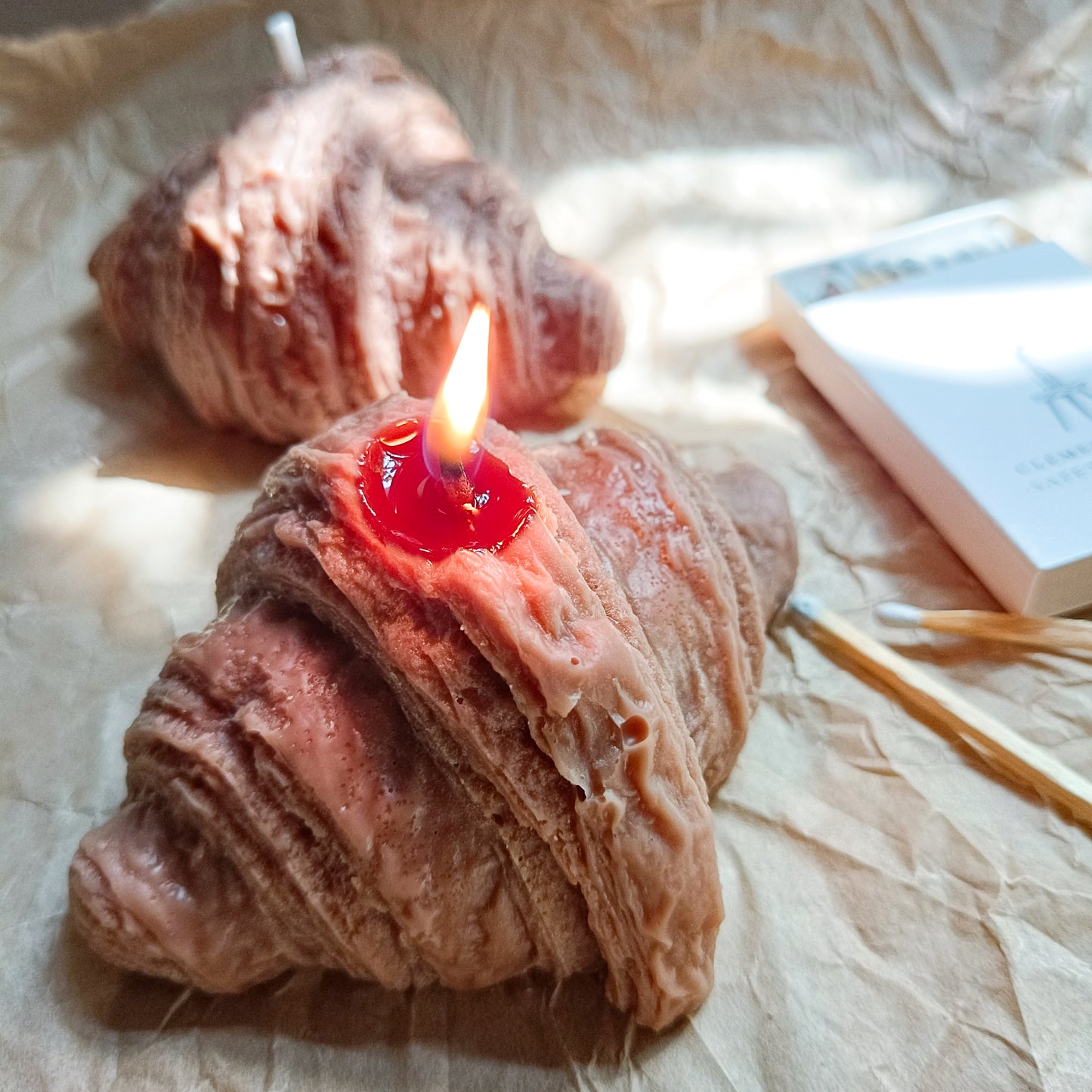Croissant shaped candle